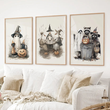 Seasonal Halloween artwork with playful raccoons, pumpkins, and ghost. Thinwood frames over the couch.