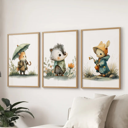 Woodland baby animals wall art three-piece set in light oak frames for the lounge, scaled to hang over a sectional sofa.