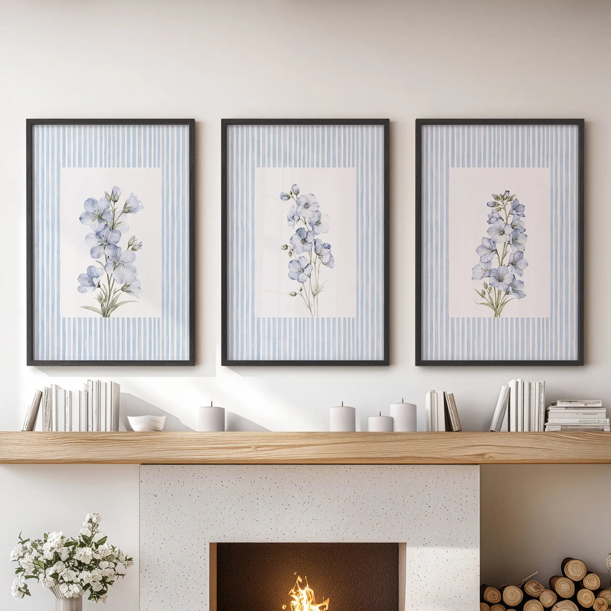 Three-print wall art set of striped botanical florals in black frames, hanging over the mantelpiece in a family room.