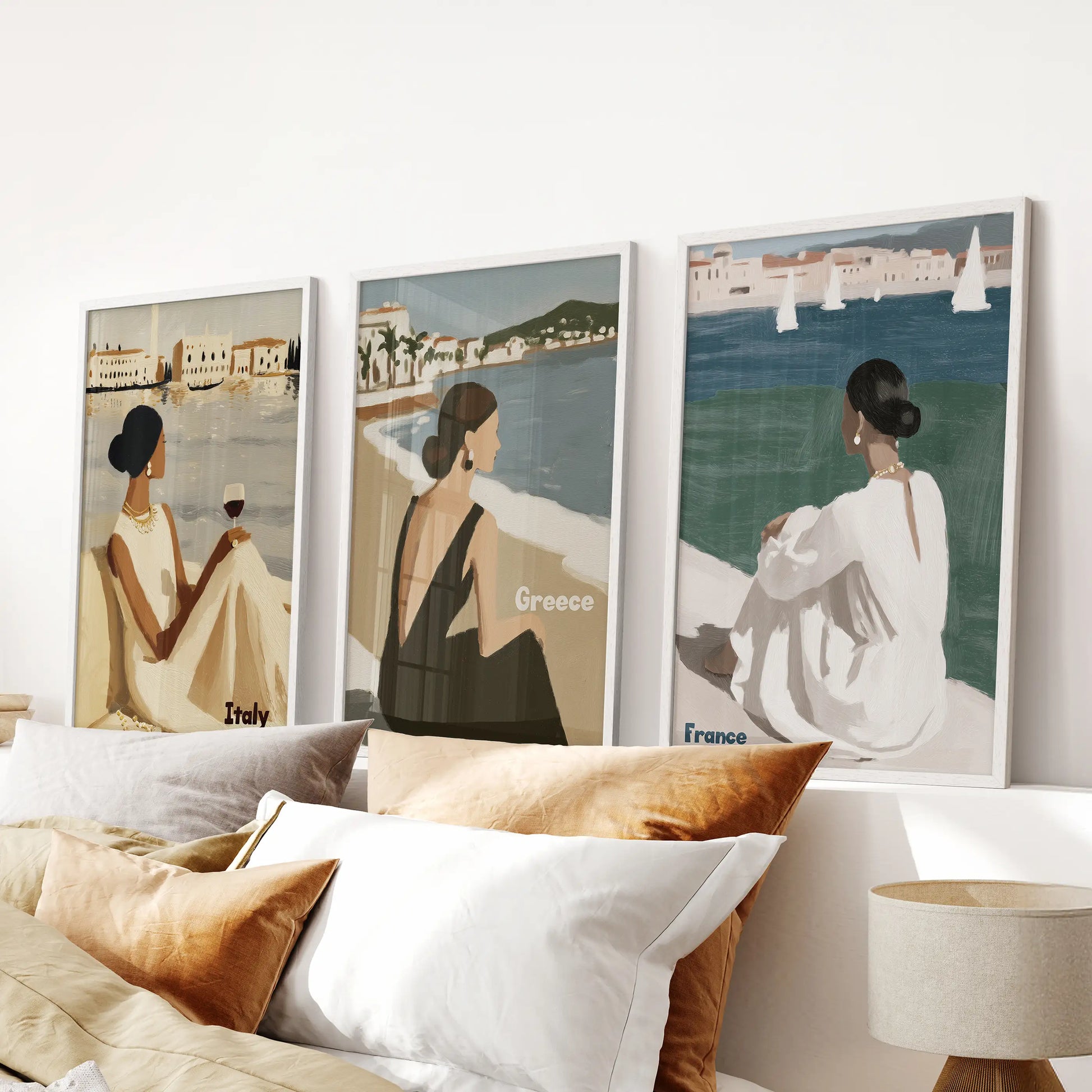 Elegant female figures set of 3 wall decor arrives over the bedroom headboard in clean white frames, adding a chic, beach-to-boulevard attitude.