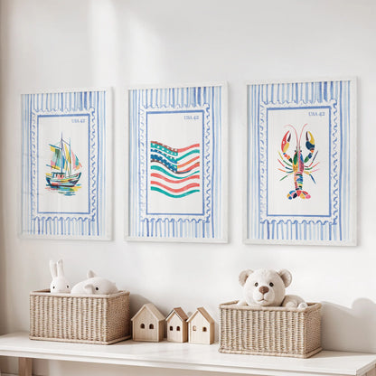 Three white-framed beach stamp art prints hang above the toy bench, adding bright seaside color to the kids’ room.