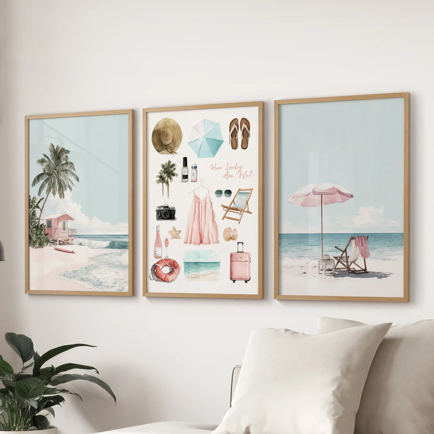 A three-piece poster art set featuring coral and sea botanical prints in solid oak frames brightens the lounge wall behind the couch.