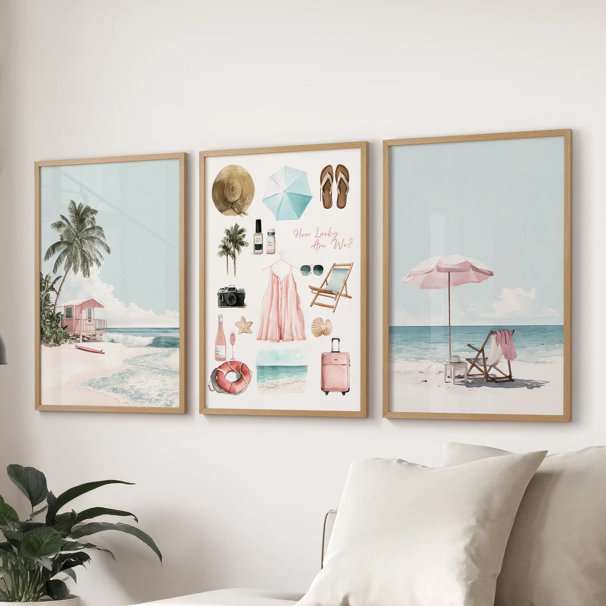 A three-piece poster art set featuring coral and sea botanical prints in solid oak frames brightens the lounge wall behind the couch.