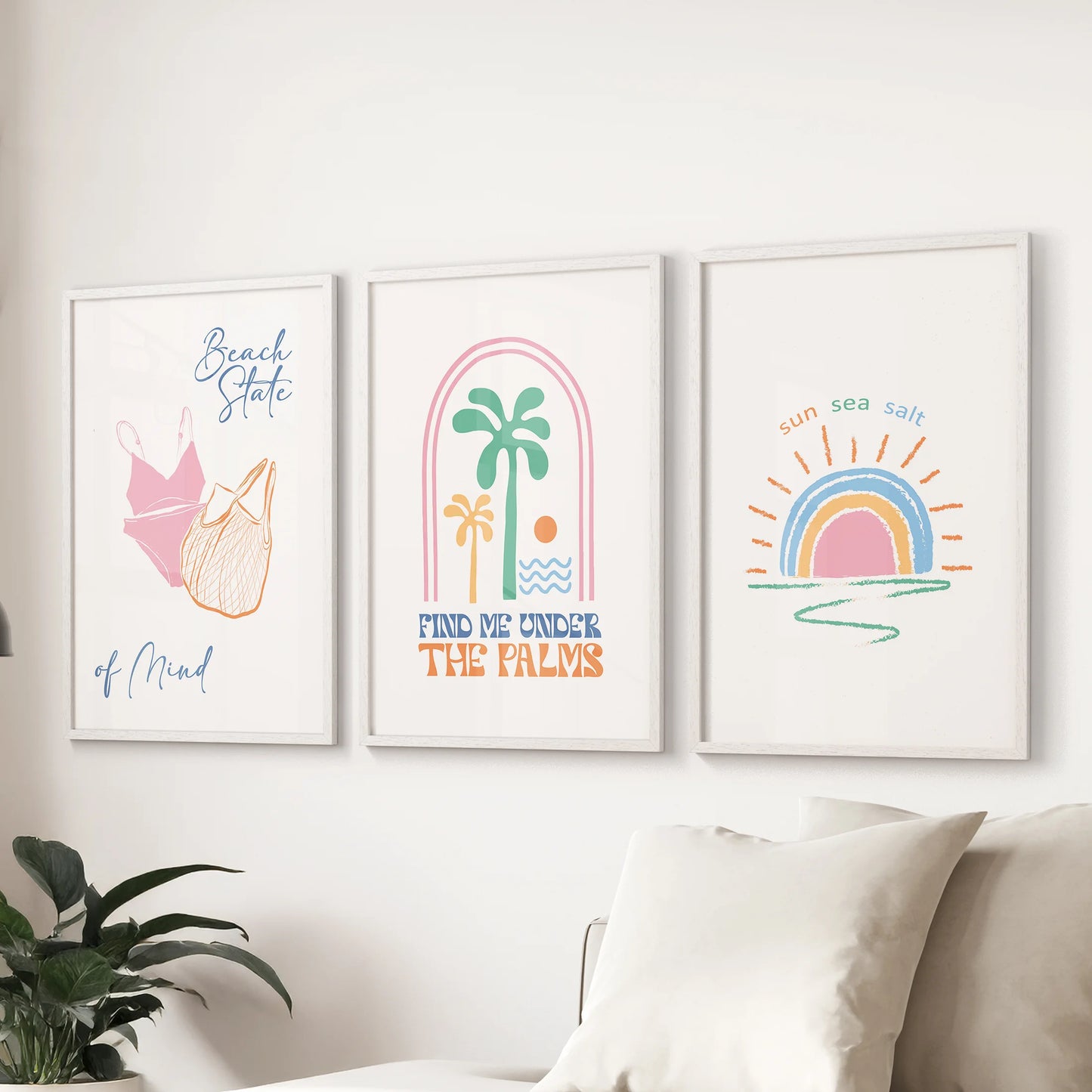Summer beach, three-print wall art set, mounts above the sectional in the lounge in bright white frames for an easy, sunlit vibe.