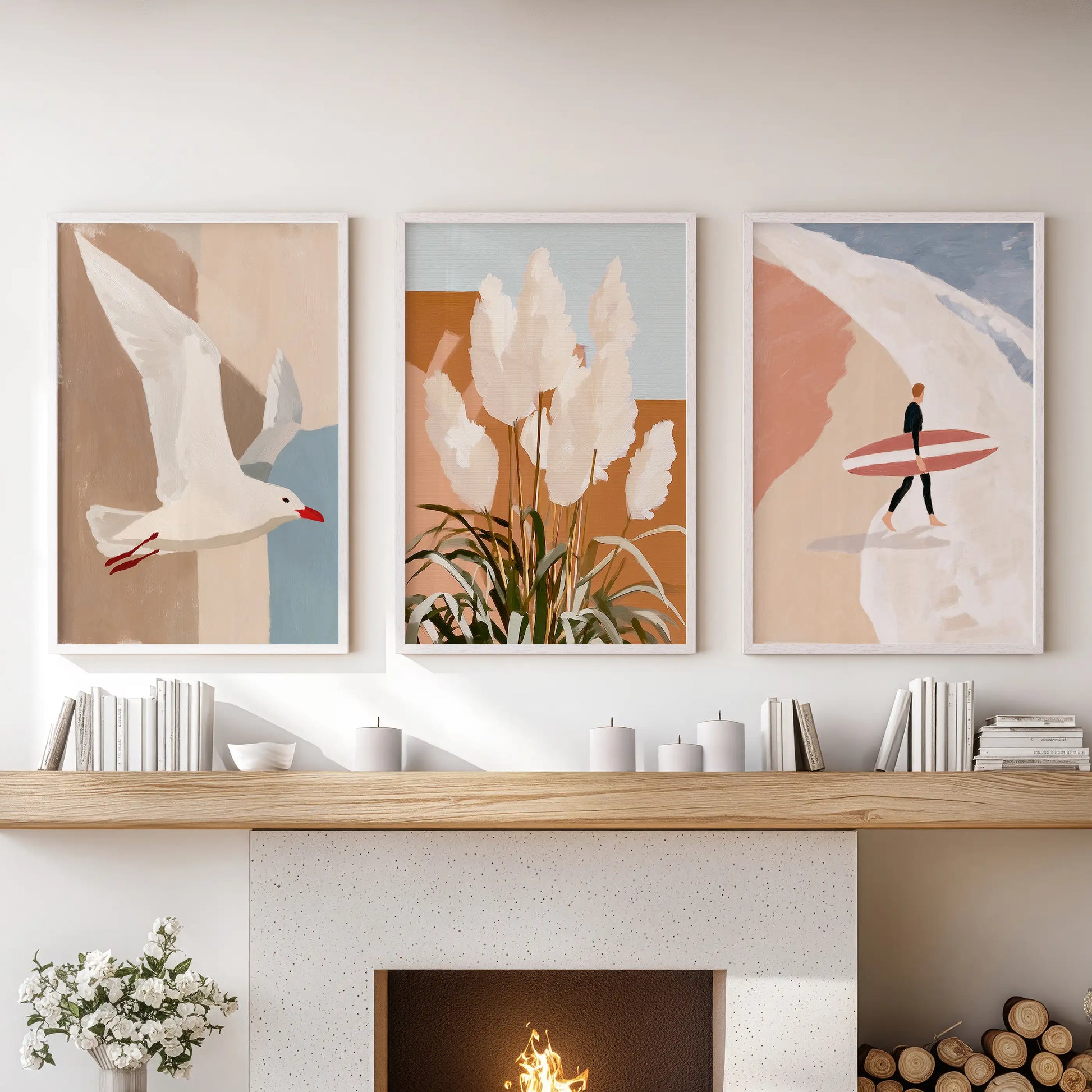 Surfer and breaking waves, a poster trio set in white frames, hangs over the hearth to infuse the living room with laid-back Australian coastal energy.