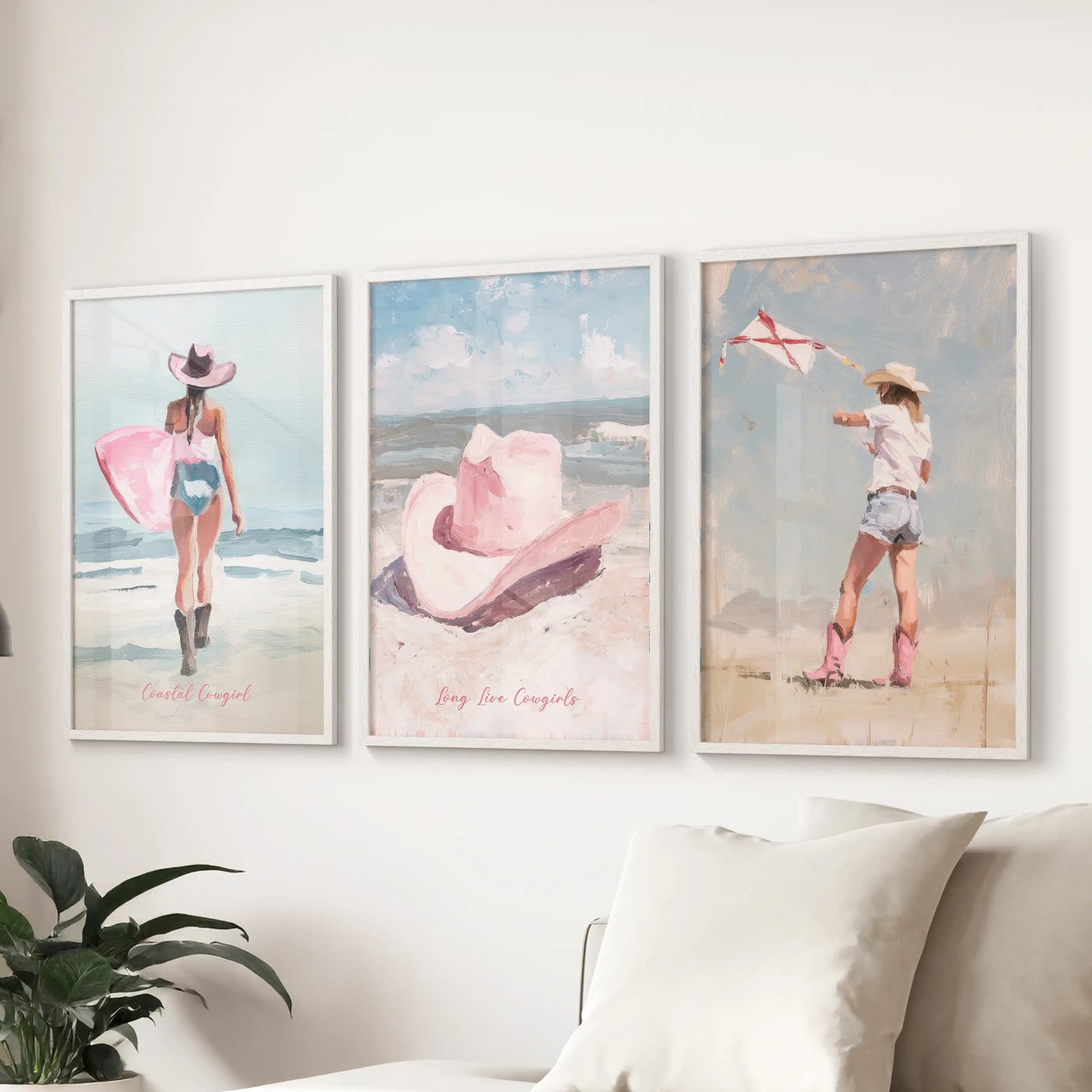 Three white-framed prints in a playful surfer girl theme line the wall above the sofa, adding a preppy, lighthearted note to the living room.
