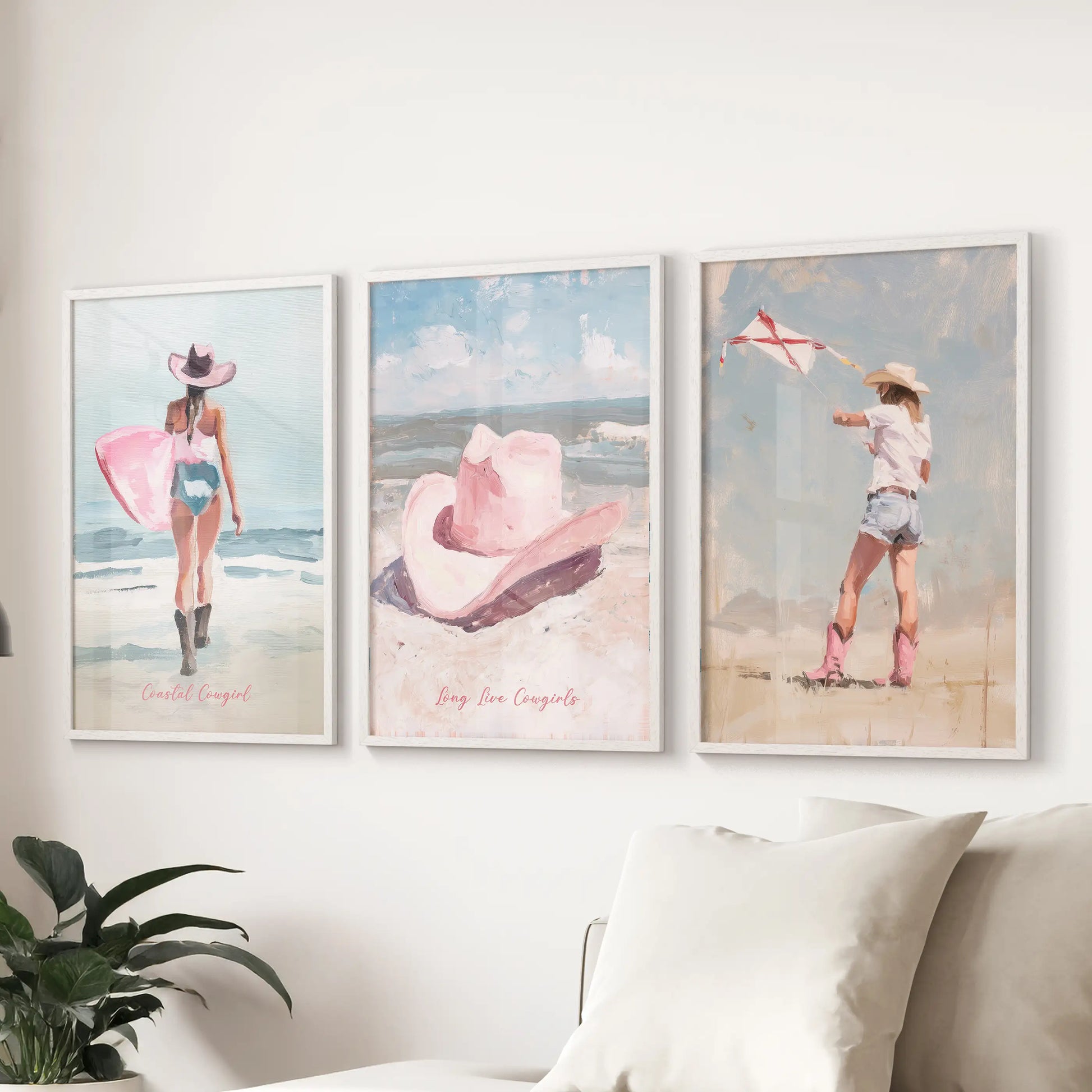 Three white-framed prints in a playful surfer girl theme line the wall above the sofa, adding a preppy, lighthearted note to the living room.