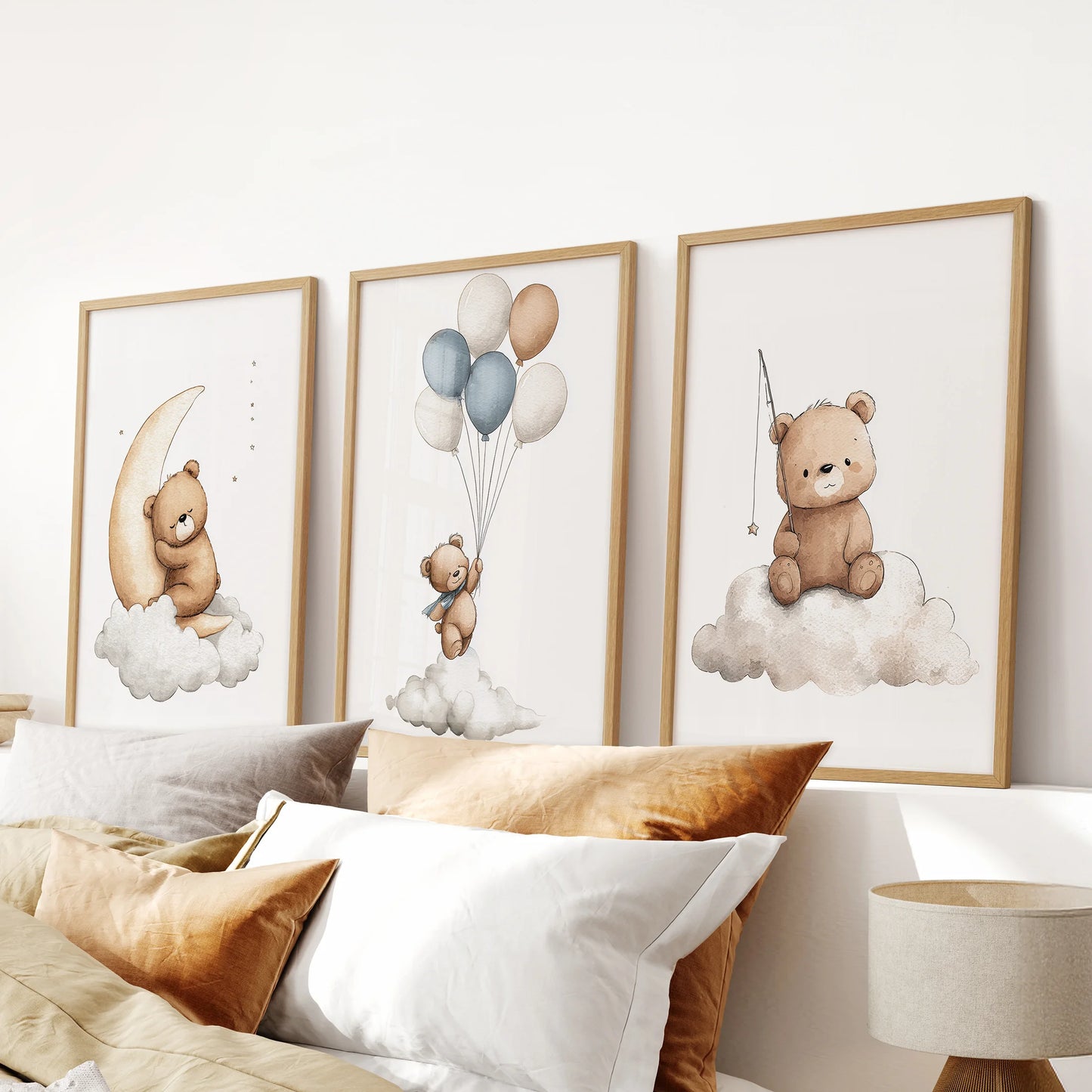 Watercolor teddy bears on clouds in a set of three, neutral background. Thinwood frames over the bed.