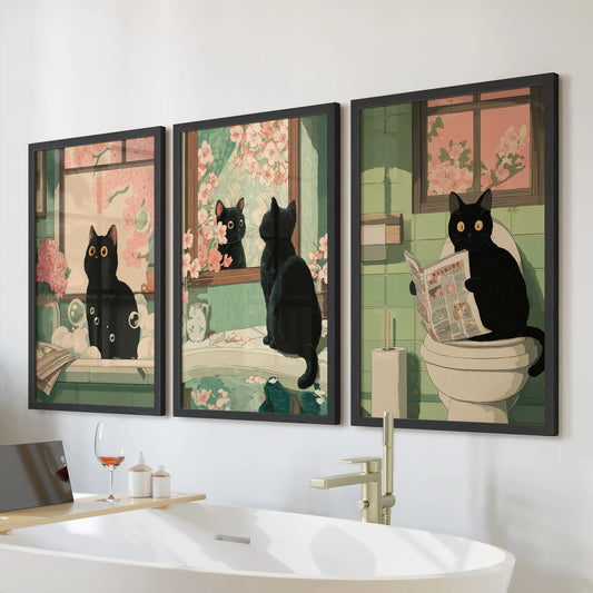 Black cat reading a newspaper, three-piece wall art set in black frames, styled for the bathroom and sized to hang neatly over the tub wall.