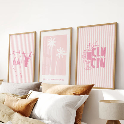 Cocktail poster wall decor, a 3-panel set with natural wood frames, hangs above the bed to layer warm, beach-meets-west charm in the bedroom.