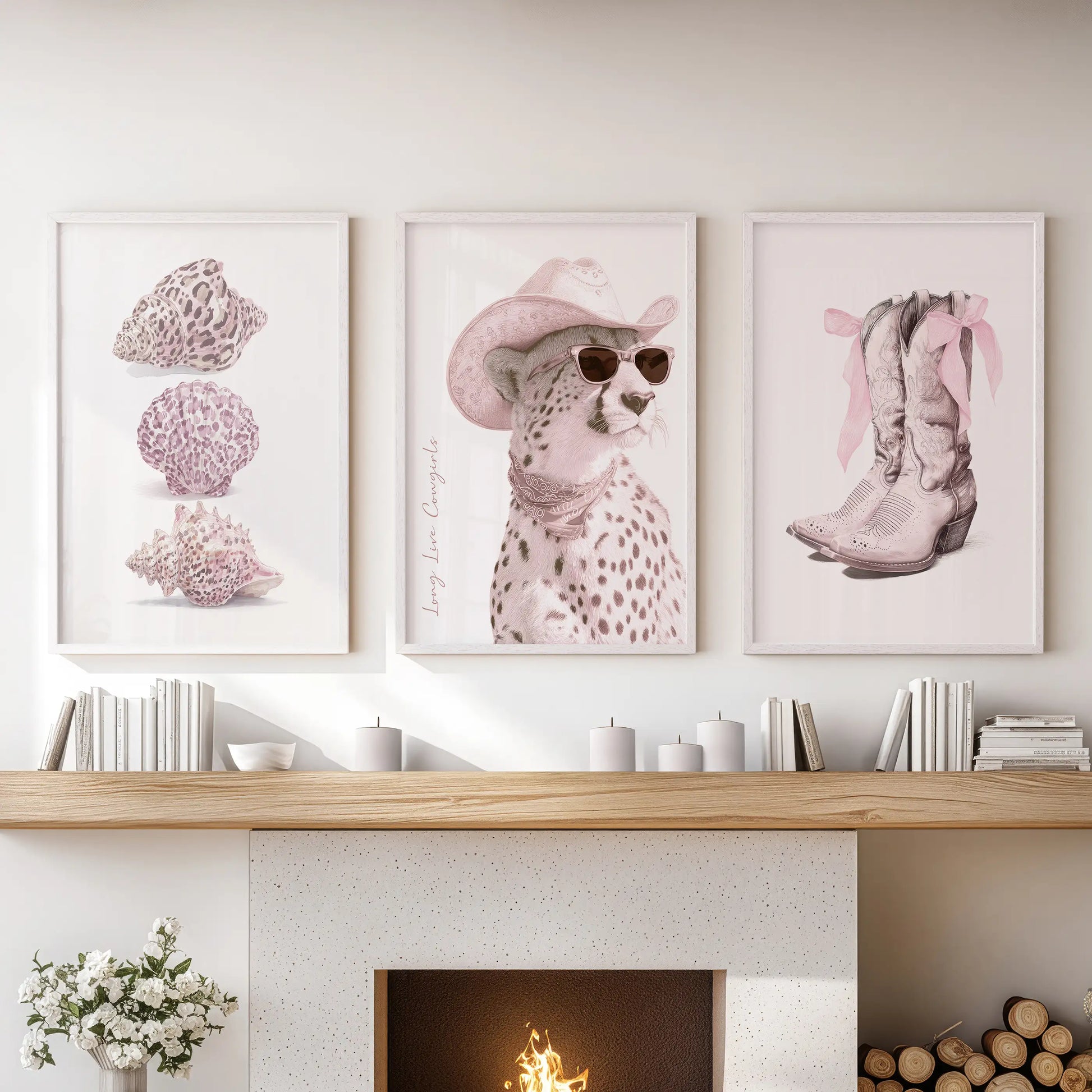A set of three seashell, cheetah, and a pair of boots wall prints in white frames drifts above the hearth, creating a light beach-inspired focal point in the family room.