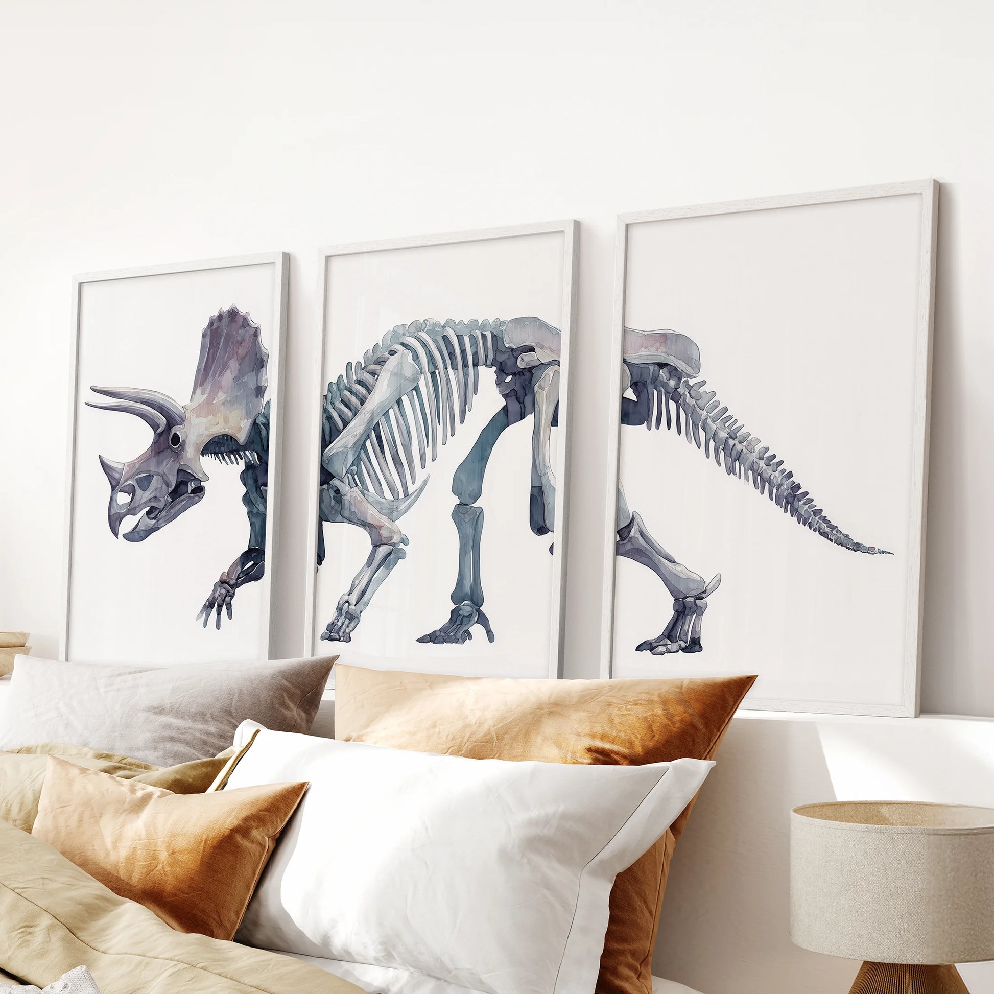 Watercolor triceratops skeleton triptych wall art creating a serene and artistic prehistoric atmosphere. 