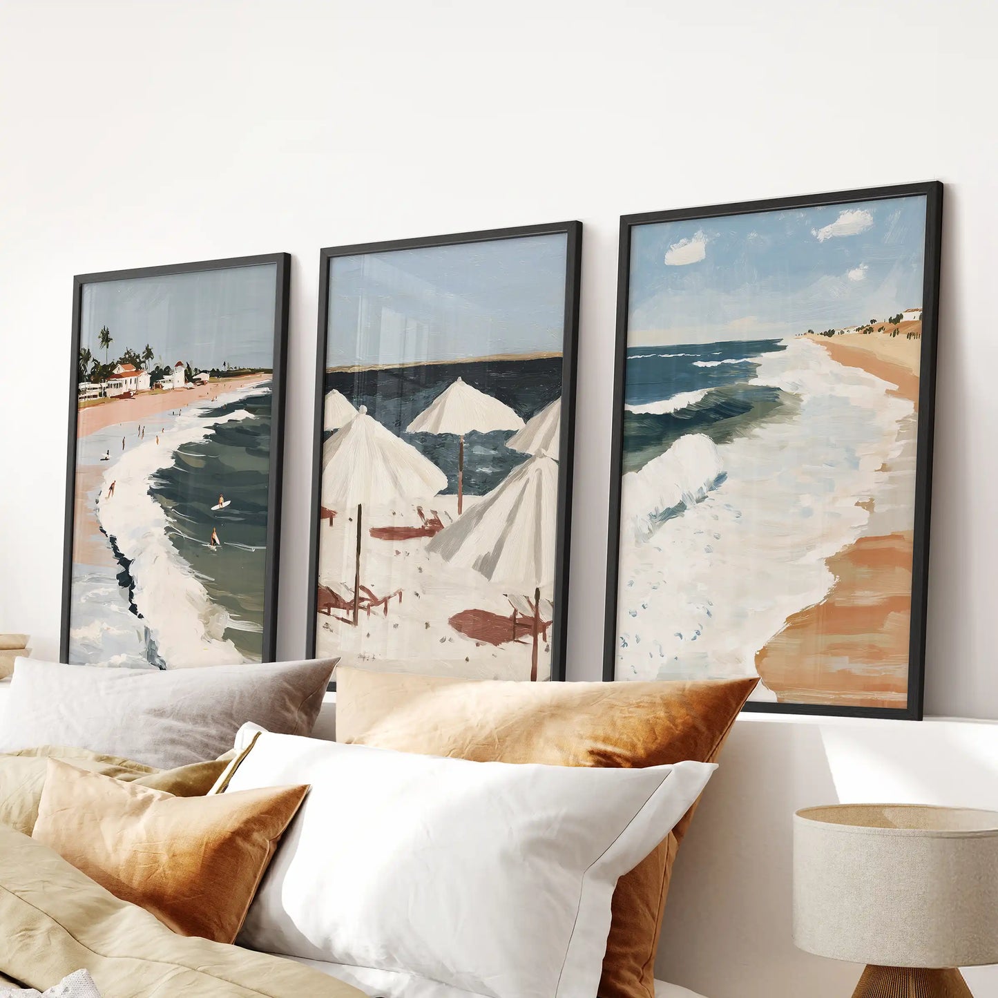Framed in sleek black, this three-piece palm-lined beach triptych centers the bedroom wall above the headboard with a relaxed coastal mood.