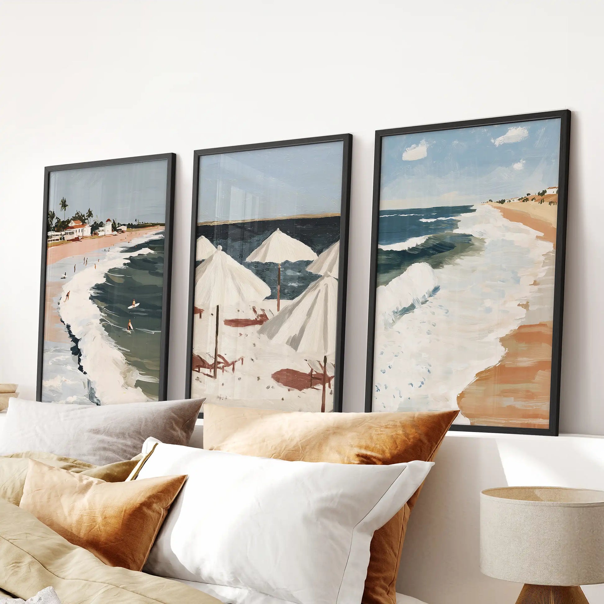Framed in sleek black, this three-piece palm-lined beach triptych centers the bedroom wall above the headboard with a relaxed coastal mood.