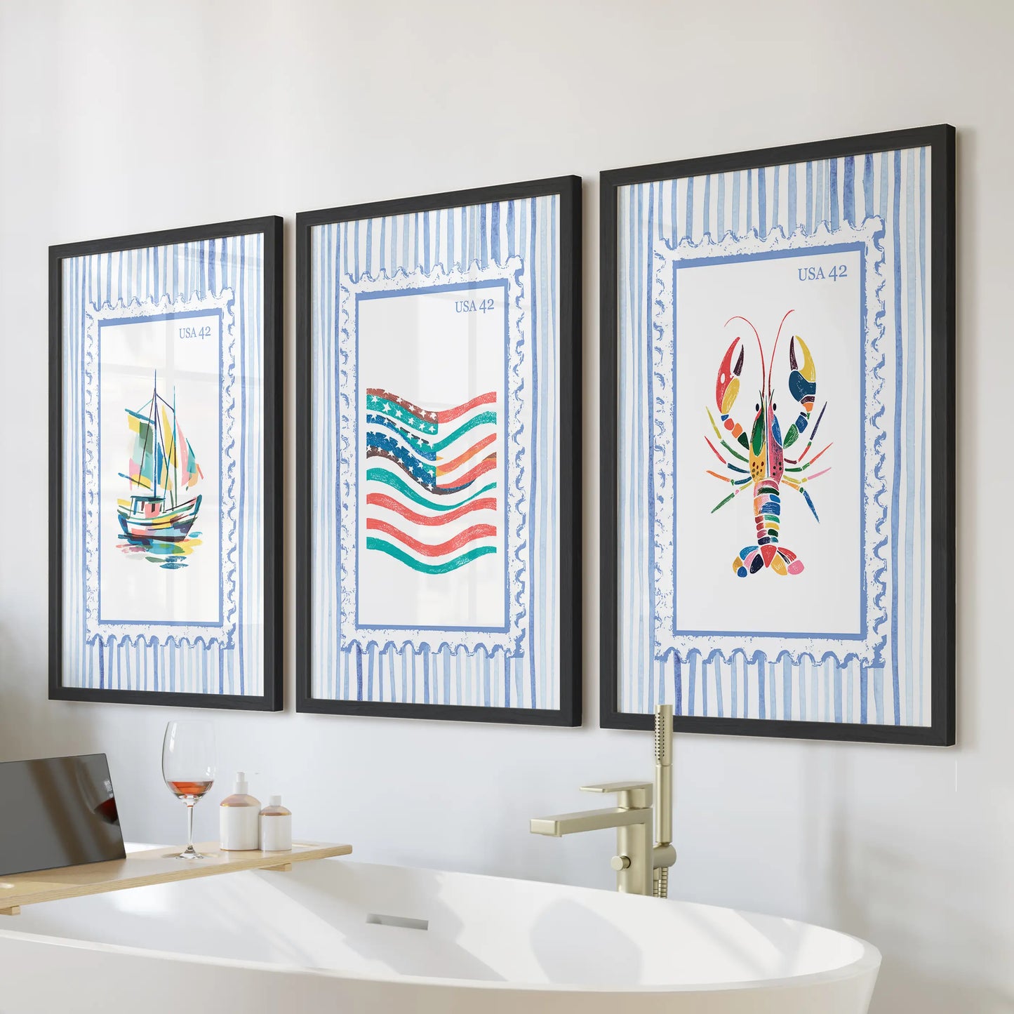 This 3-piece wall art set of a lobster boat with the US flag comes in sleek black frames, styled neatly above the bathtub for a nautical touch.