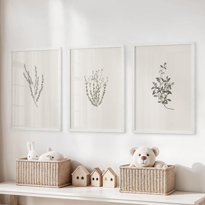 Cottagecore wildflower sprigs 3-piece wall hanging set, in white framed prints, hangs above toy storage in the playroom for a light, nostalgic touch.