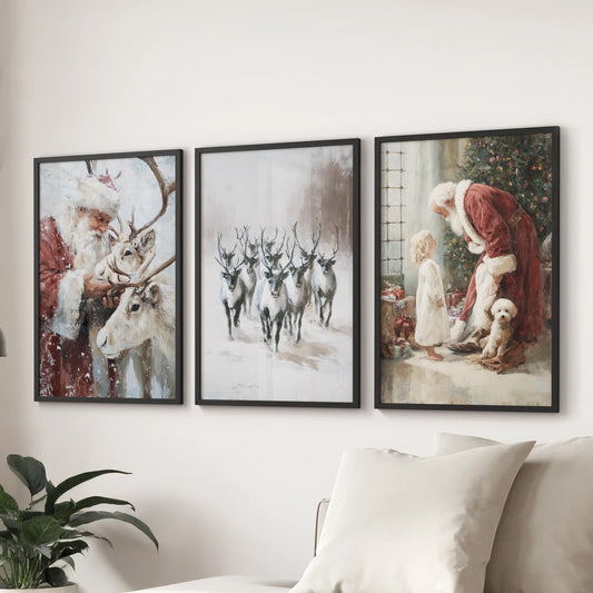 A set of three black framed Christmas deer prints brings softly aged color and snowy calm to the family room, arranged over the sofa.