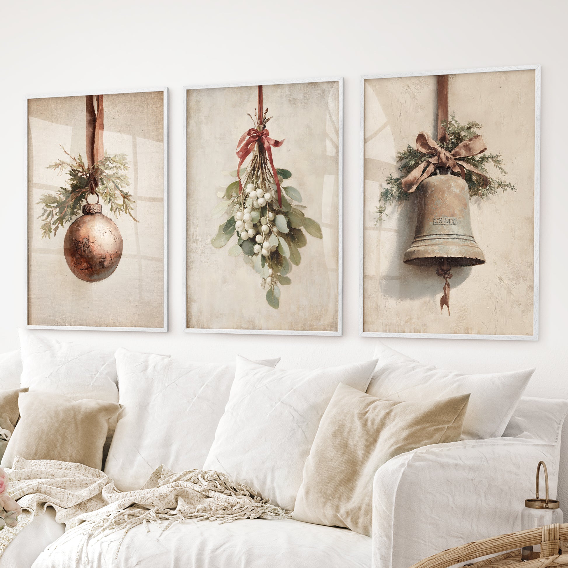 Rustic holiday wall art set for farmhouse Christmas home decor. White frames above the sofa.