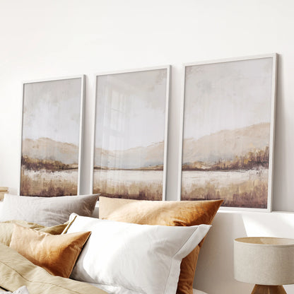 Minimalist nature landscape painting set of three in white frames centers the space above the headboard, keeping the bedroom airy and serene.