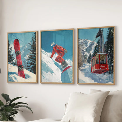 Ski lodge scenes, a 3-piece wall art set in wood frames, rest over the family room sofa and invite fireside comfort with a retro resort look.