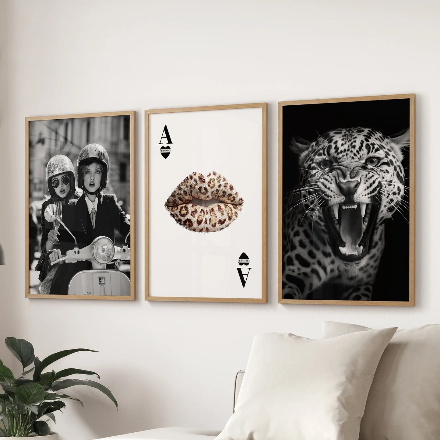 Fashionable print cover wall art, a set of three with warm wooden frames for the lounge, neatly aligned over the couch for an editorial vibe.