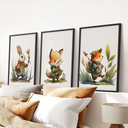 Set of three black-framed watercolor animal artworks centered above the bed adds a soft forest accent to the bedroom.