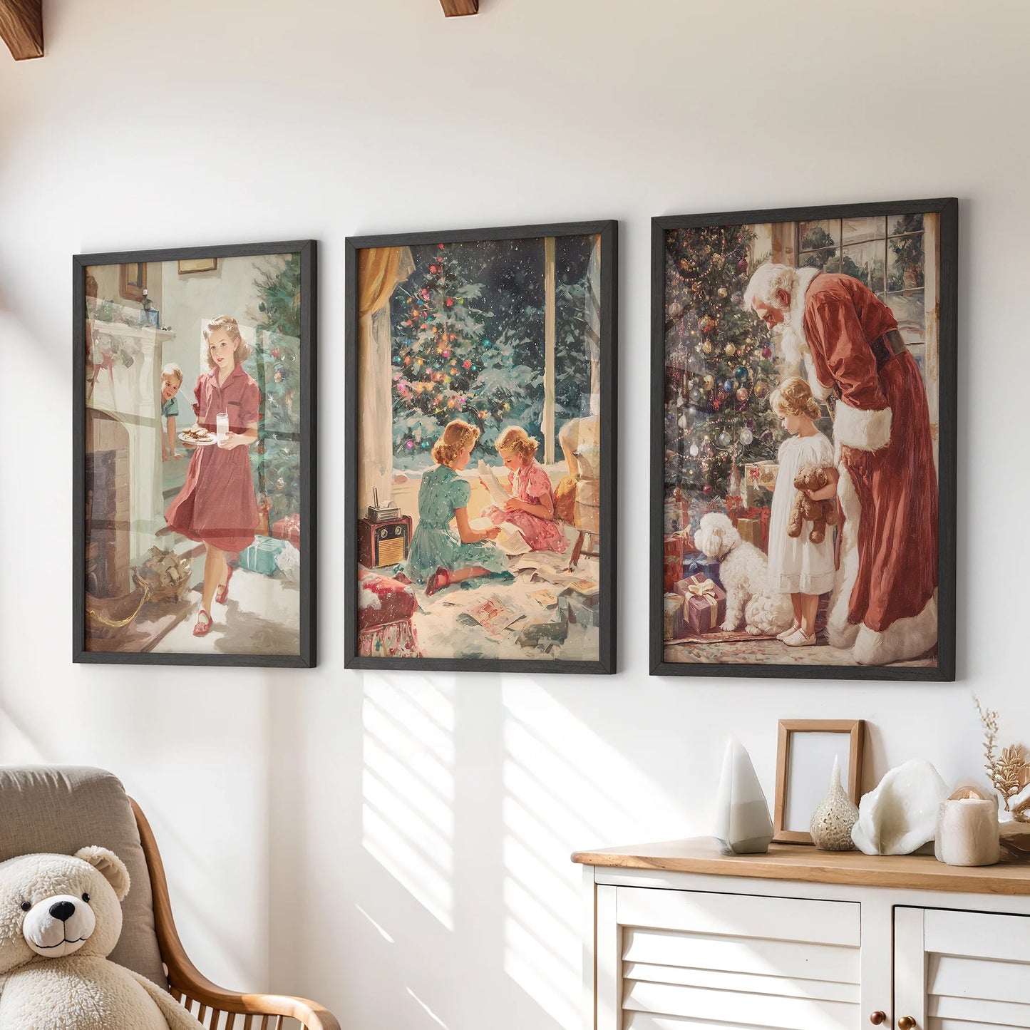 Black-framed Santa Claus prints, a set of three wall art pieces, add a cozy retro touch to a children's room above the chest of drawers.