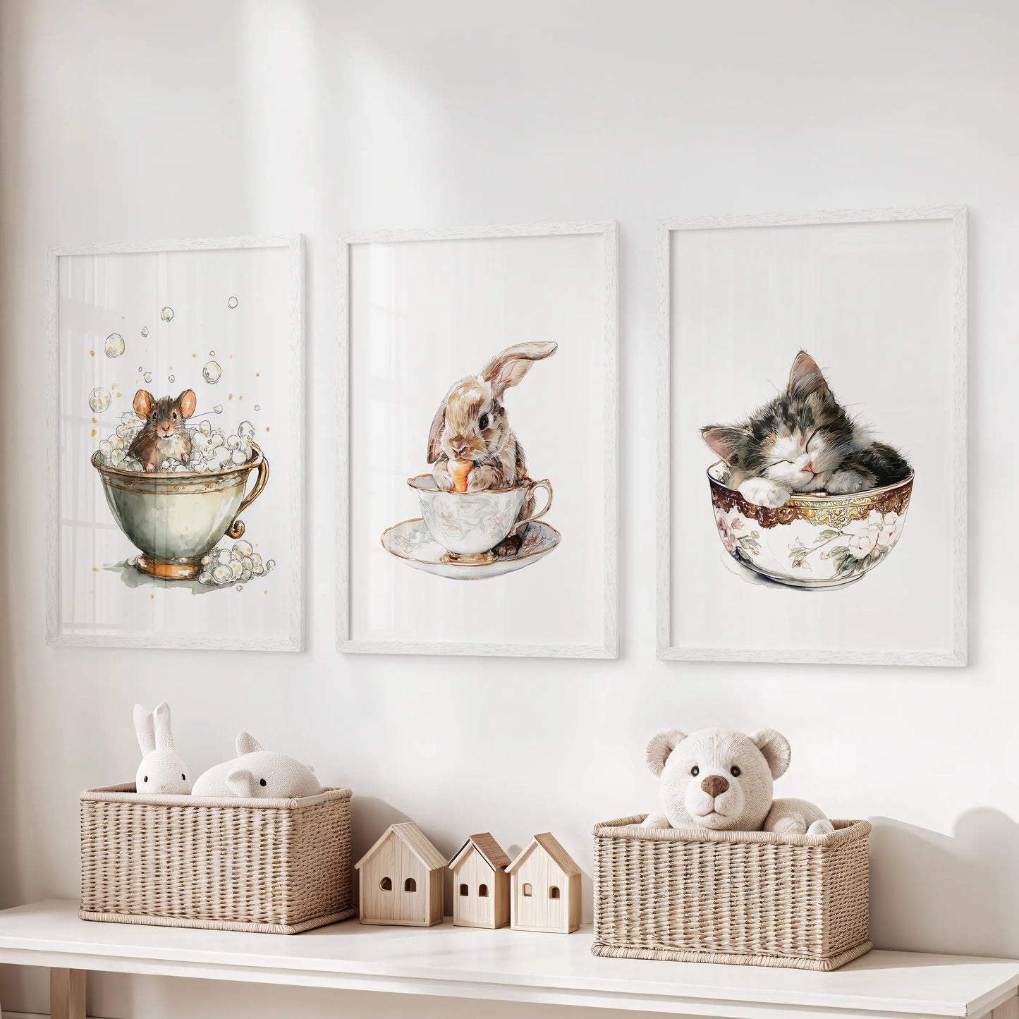 Three white-framed prints of whimsical woodland creatures line the playroom wall above the storage bench for a bright, imaginative touch.
