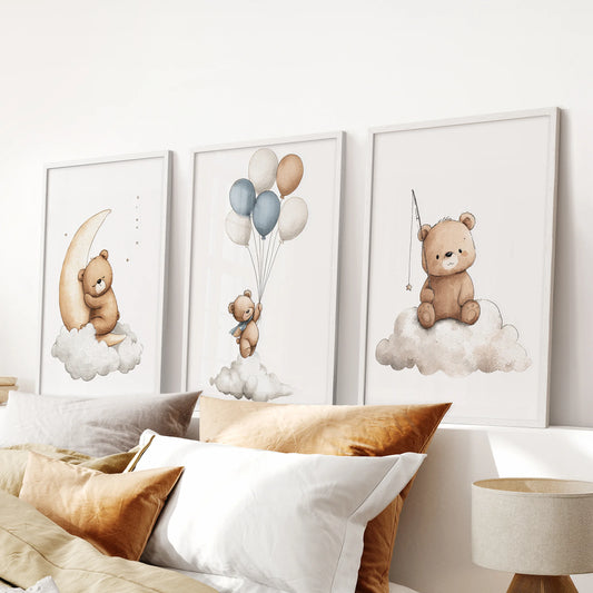 Neutral nursery gallery wall with bear sleeping on a crescent moon, bear floating with balloons, and bear fishing a star.