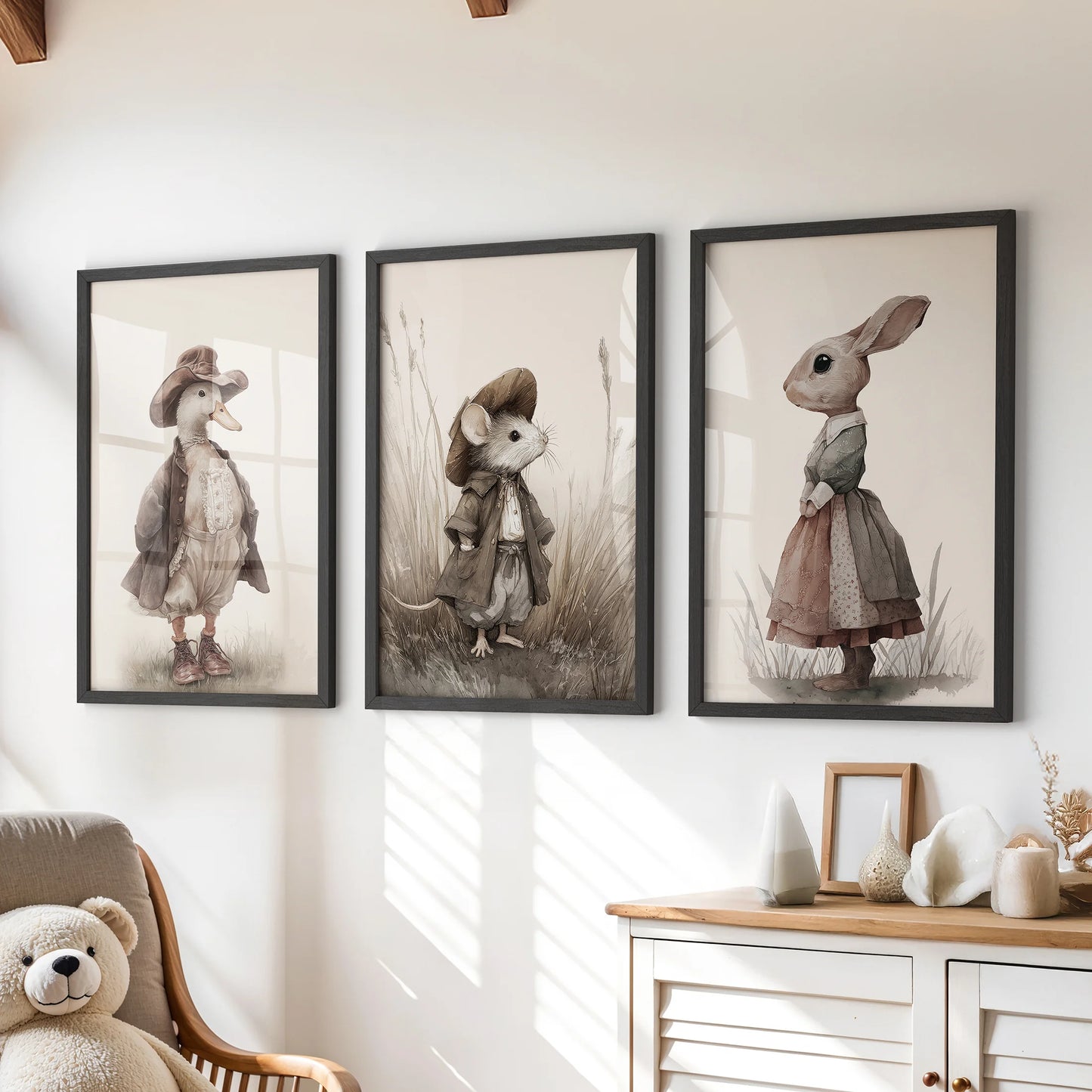 Vintage goose wall art, 3-poster bundle in black frames, arranged over a dresser in a children's room with matching rabbit and mouse prints.