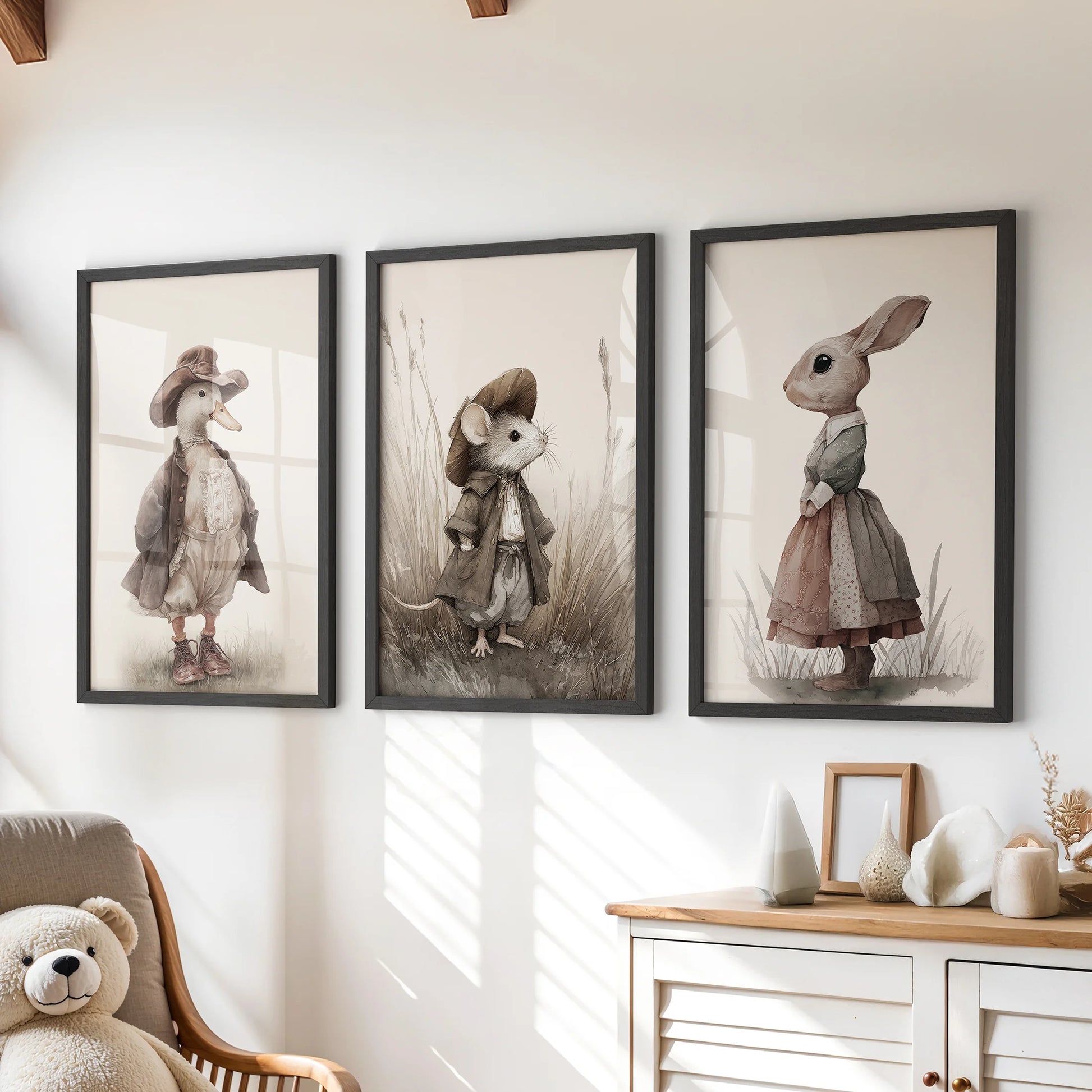 Vintage goose wall art, 3-poster bundle in black frames, arranged over a dresser in a children's room with matching rabbit and mouse prints.