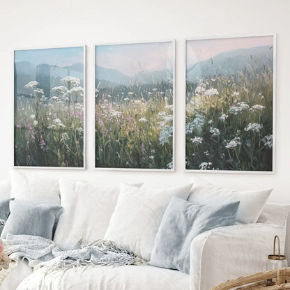 Cottagecore style nature wall art featuring wildflowers and soft mountains. White frames for living room.