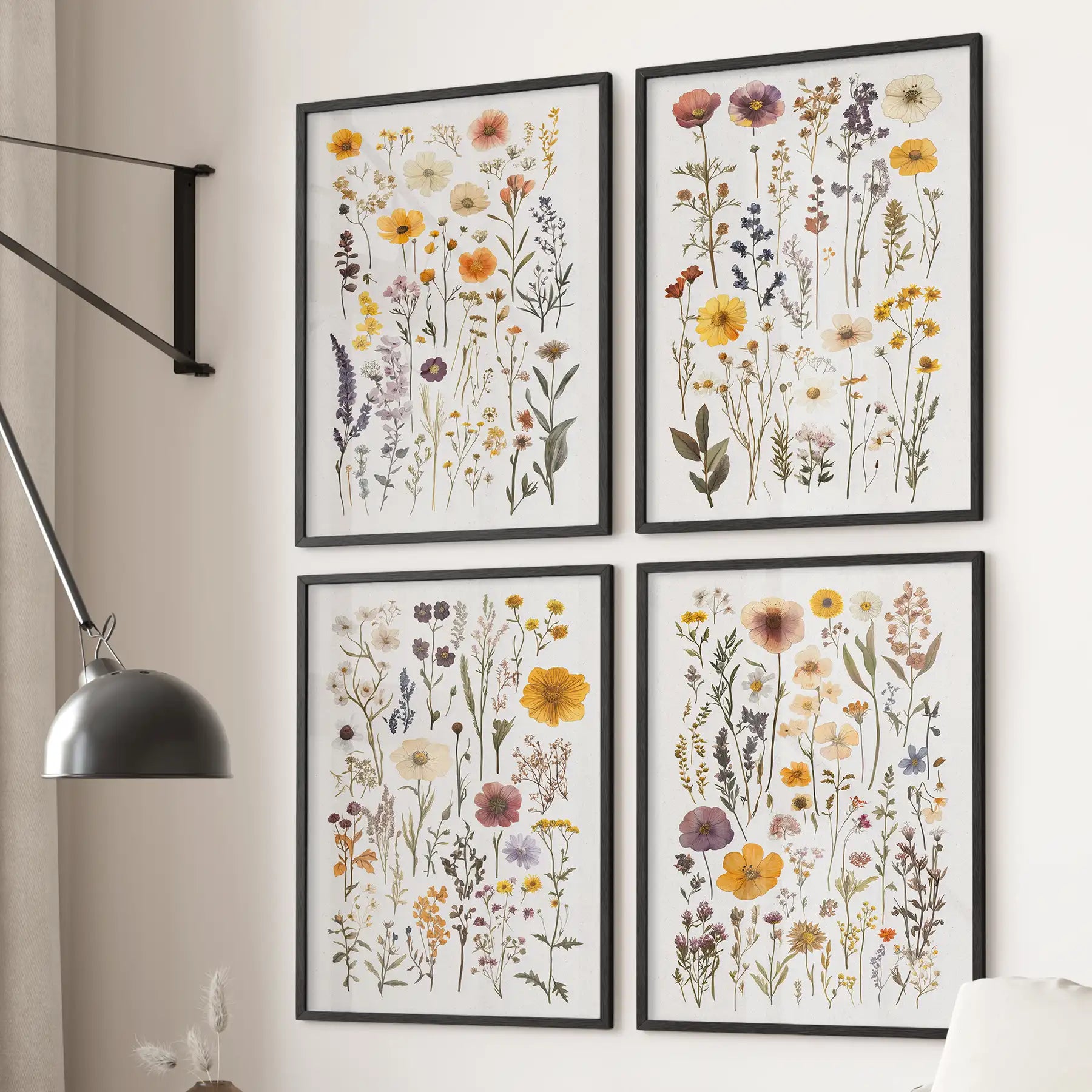 Modern wildflower wall art set featuring herbarium-style floral illustrations. Black frames for living room.