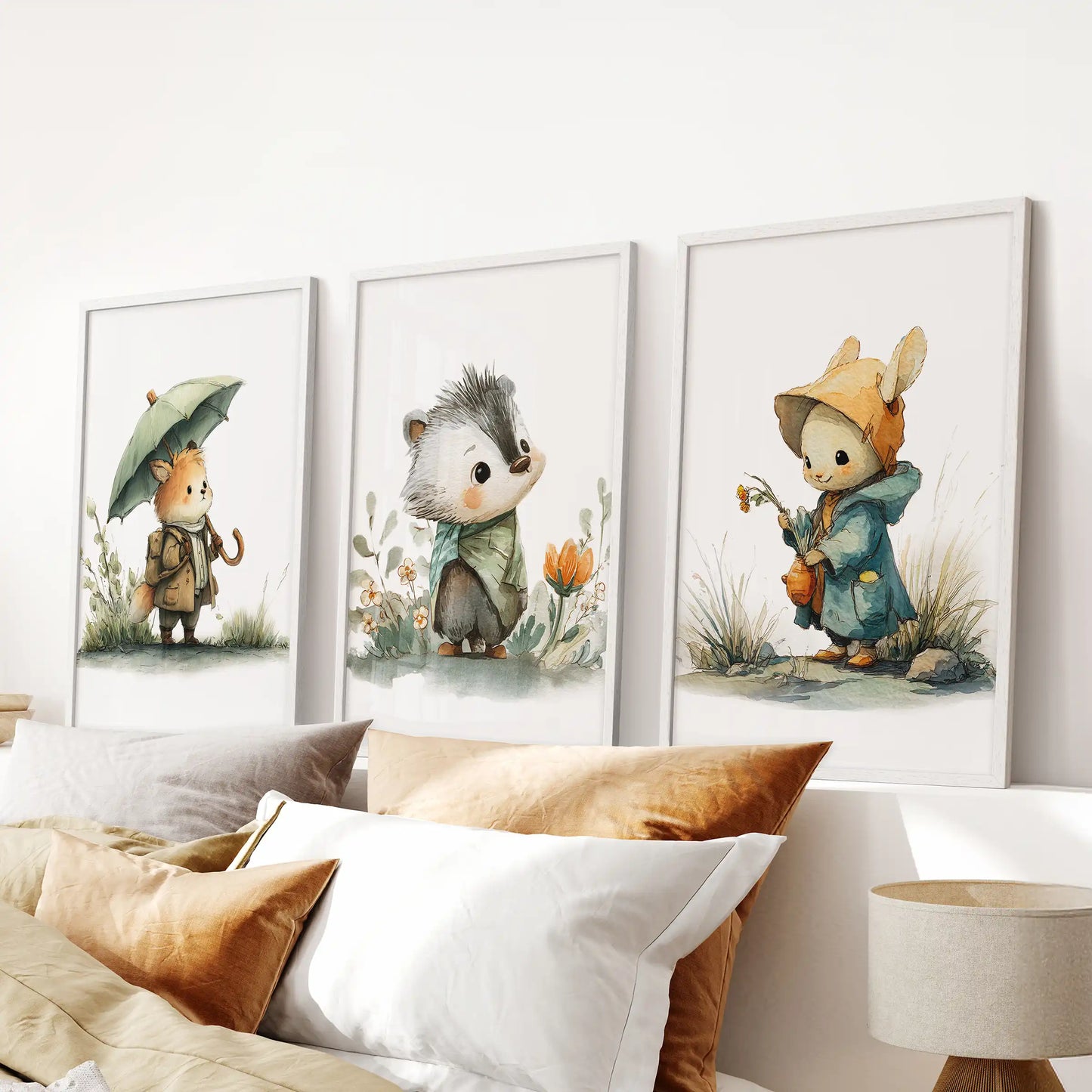 Storybook woodland animals wall art, three prints in white frames for a bedroom, meant to hang over the headboard.