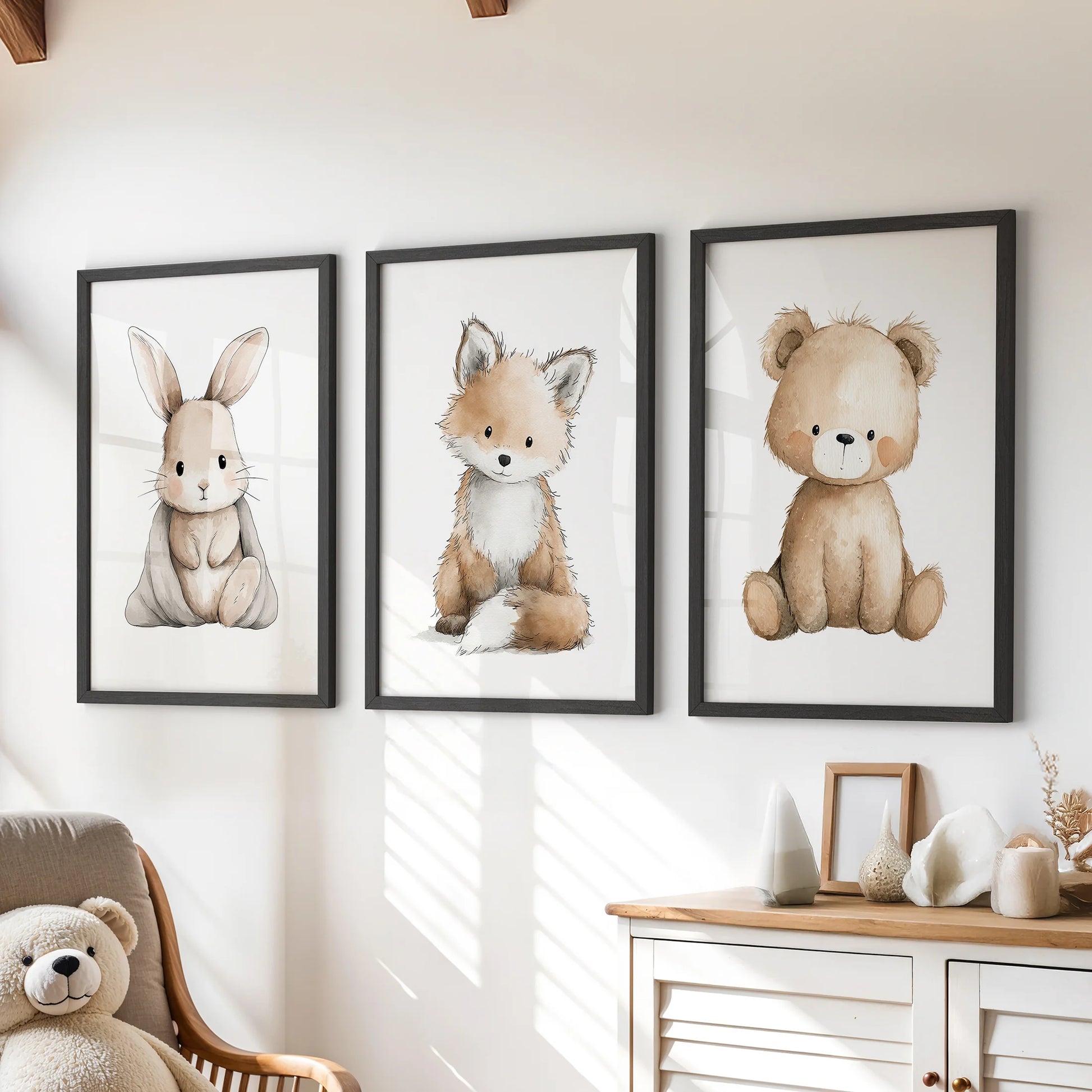 Woodland animals nursery wall decor trio set of three wall art prints in black frames, styled for a kids room and arranged over a dresser for a cozy focal point.