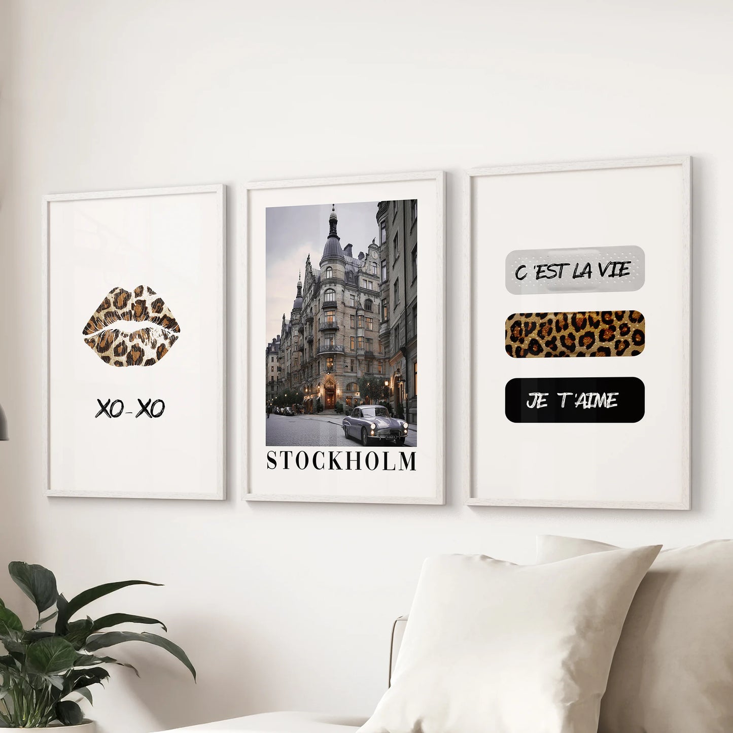 Glossy lips poster set of three adds playful glamour to the living room above the sofa, shown in crisp white frames for a bright, airy feel.